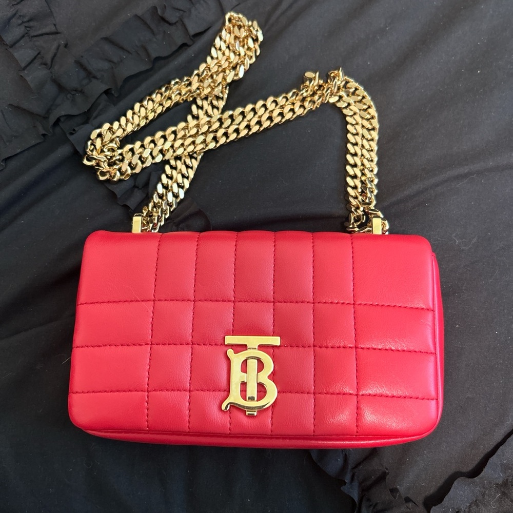 Red and gold Burberry crossbody